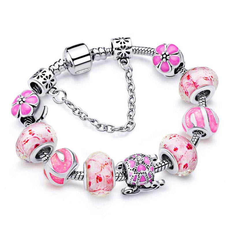 Pulseira de Contas/Charms Tons de Rosa com Flores e Coche com Cristais - REF1148 - PIME.pt