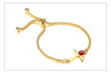 Carregar imagem no visualizador da galeria, Pulseira Ajustável Dourada com Cruz e Pedra Vermelha - em Aço - REF1573 - PIME.pt