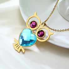 Carregar imagem no visualizador da galeria, Colar Dourado Mocho com Olhos de Cristal e Coração Azul - em Aço - REF1540 - PIME.pt