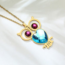 Carregar imagem no visualizador da galeria, Colar Dourado Mocho com Olhos de Cristal e Coração Azul - em Aço - REF1540 - PIME.pt